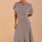 model wearing a divacatwalk Selene Stripes Swing Dress with stripes in navy blue colour front image