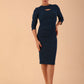 Model wearing a Clementine Keyhole Sleeved Pencil Dress in Teal colour