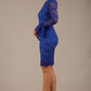 brunette model wearing a diva catwalk Tatiana fluted sleeved satin dress fluted long sleeves length pencil dress in cobalt blue lace colour front side
