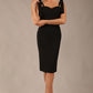 brunette model wearing a diva catwalk Philippa Pencil Wiggle Dress sleeveless style, tie detail on the shoulders knee length and sweetheart neckline in black colour front 
