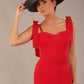 brunette model wearing a diva catwalk Philippa Pencil Wiggle Dress sleeveless style, tie detail on the shoulders knee length and sweetheart neckline in scarlet red colour front with hat
