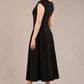 brunette model is wearing a diva catwalk Audrey Dress With Pockets sleeveless and ankle length in black colour