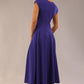 brunette model is wearing a diva catwalk Audrey Dress With Pockets sleeveless and ankle length in spectrum indigo colour