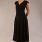 brunette model is wearing a diva catwalk Audrey Dress With Pockets sleeveless and ankle length in black colour