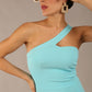 Model wearing a divacatwalk Sofia Pencil Dress knee length front side vent with diagonal halter neck in turquoise colour front