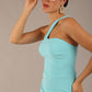 Model wearing a divacatwalk Sofia Pencil Dress knee length front side vent with diagonal halter neck in turquoise colour front