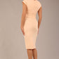 brunette model is wearing a diva catwalk Claire Cap Sleeve Pencil Dress cap sleeve with round neckline with v-slit and knee length in tropical peach colour back