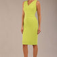 brunette model is wearing a diva catwalk Carrie Pencil Wiggle Dress sleeveless v neck front and back knee length in lime green colour front image