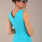 model wearing a diva catwalk Carrie Pencil Wiggle Dress sleeveless in azure blue colour back close up