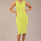model wearing a diva catwalk Carrie Pencil Wiggle Dress sleeveless in lime green colour front