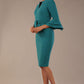 brunette model is wearing a diva catwalk Hobson ruffled sleeves Pencil Dress with tie waistband knee length in Teal Green colour front