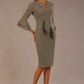 brunette model is wearing a diva catwalk Hobson ruffled sleeves Pencil Dress with tie waistband knee length in Castlerock Grey colour front
