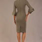 brunette model is wearing a diva catwalk Hobson ruffled sleeves Pencil Dress with tie waistband knee length in Castlerock Grey colour back