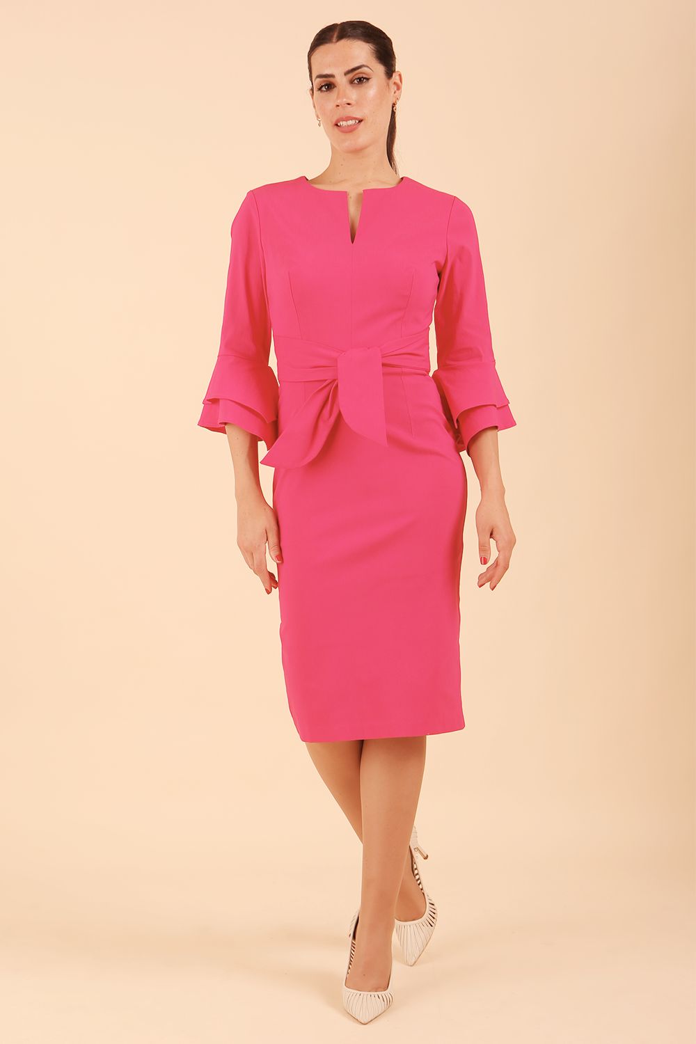 model wearing a diva catwalk Hobson ruffled sleeves Pencil Dress in Fuchsia Pink colour