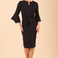 model wearing a diva catwalk Hobson ruffled sleeves Pencil Dress in Navy Blue colour