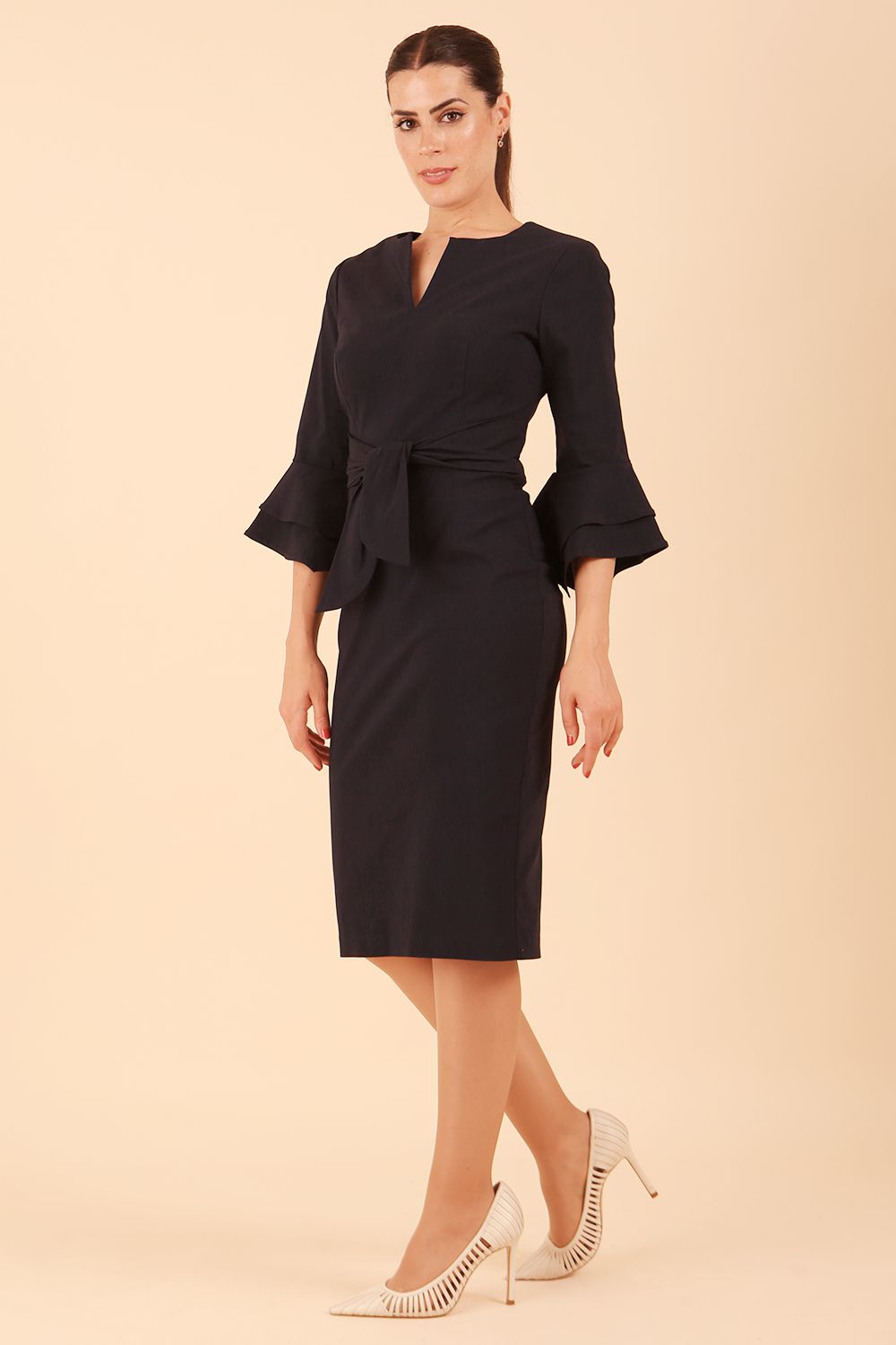 model wearing a diva catwalk Hobson ruffled sleeves Pencil Dress in Navy Blue colour