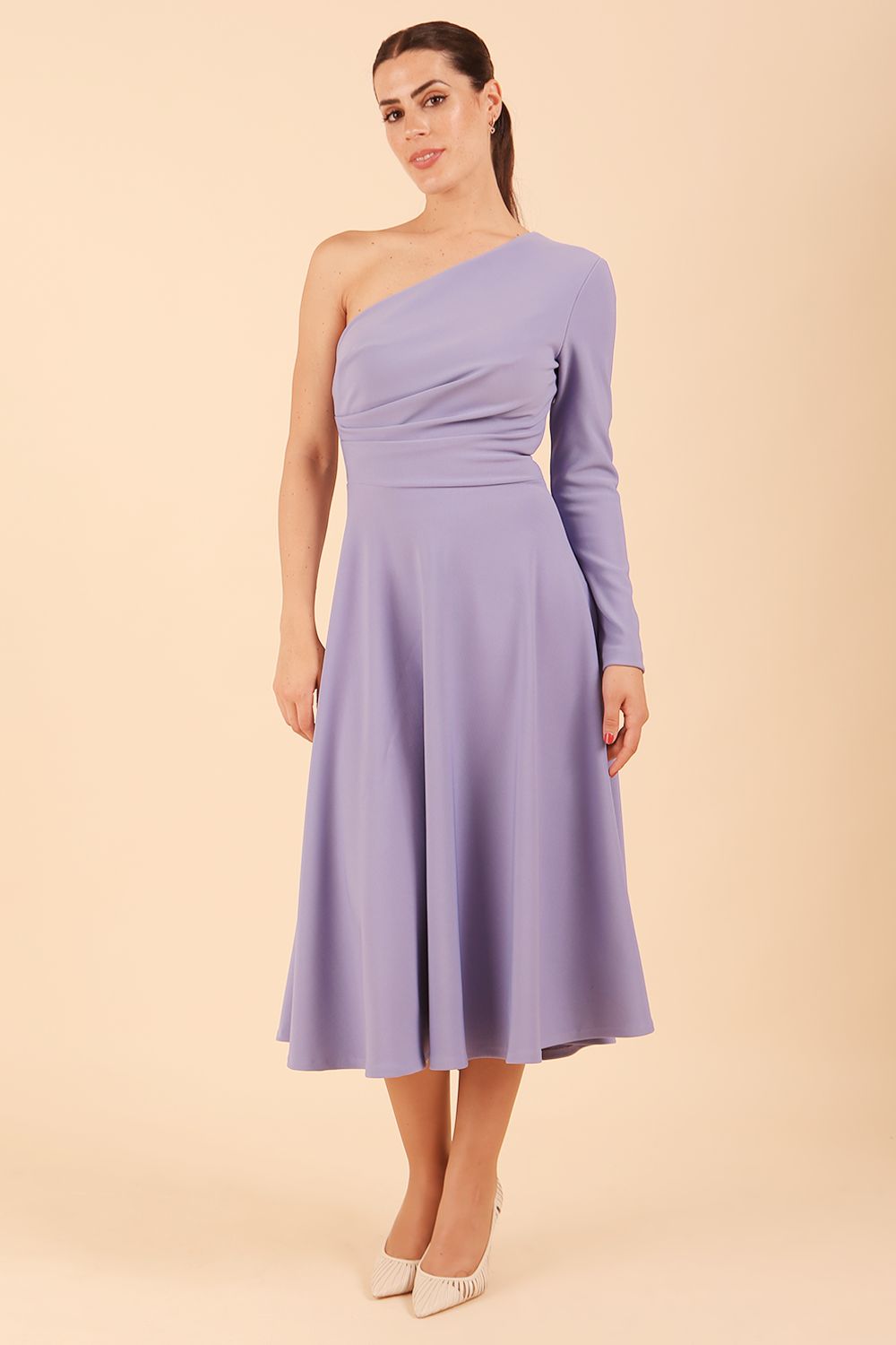 model wearing a diva catwalk Beverley One Shoulder A-line Dress in ribbed super stretch fabric and one long sleeve a-line skirt midi length in vista blue colour front