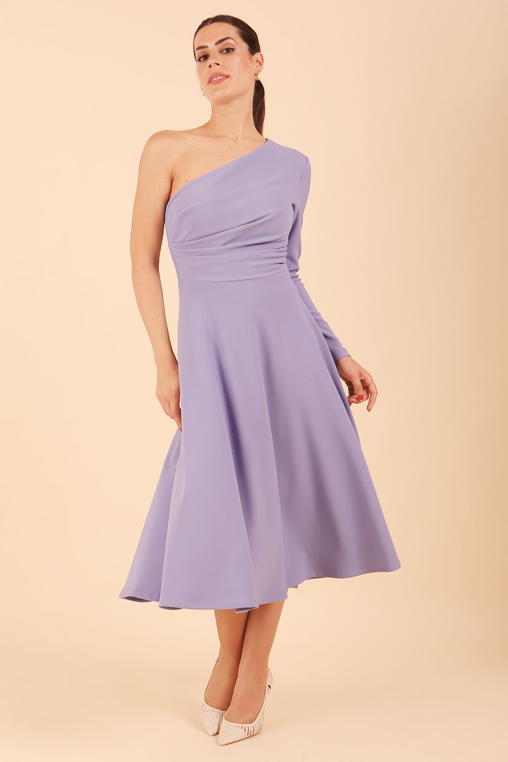 model wearing a diva catwalk Beverley One Shoulder A-line Dress in ribbed super stretch fabric and one long sleeve a-line skirt midi length in vista blue colour front