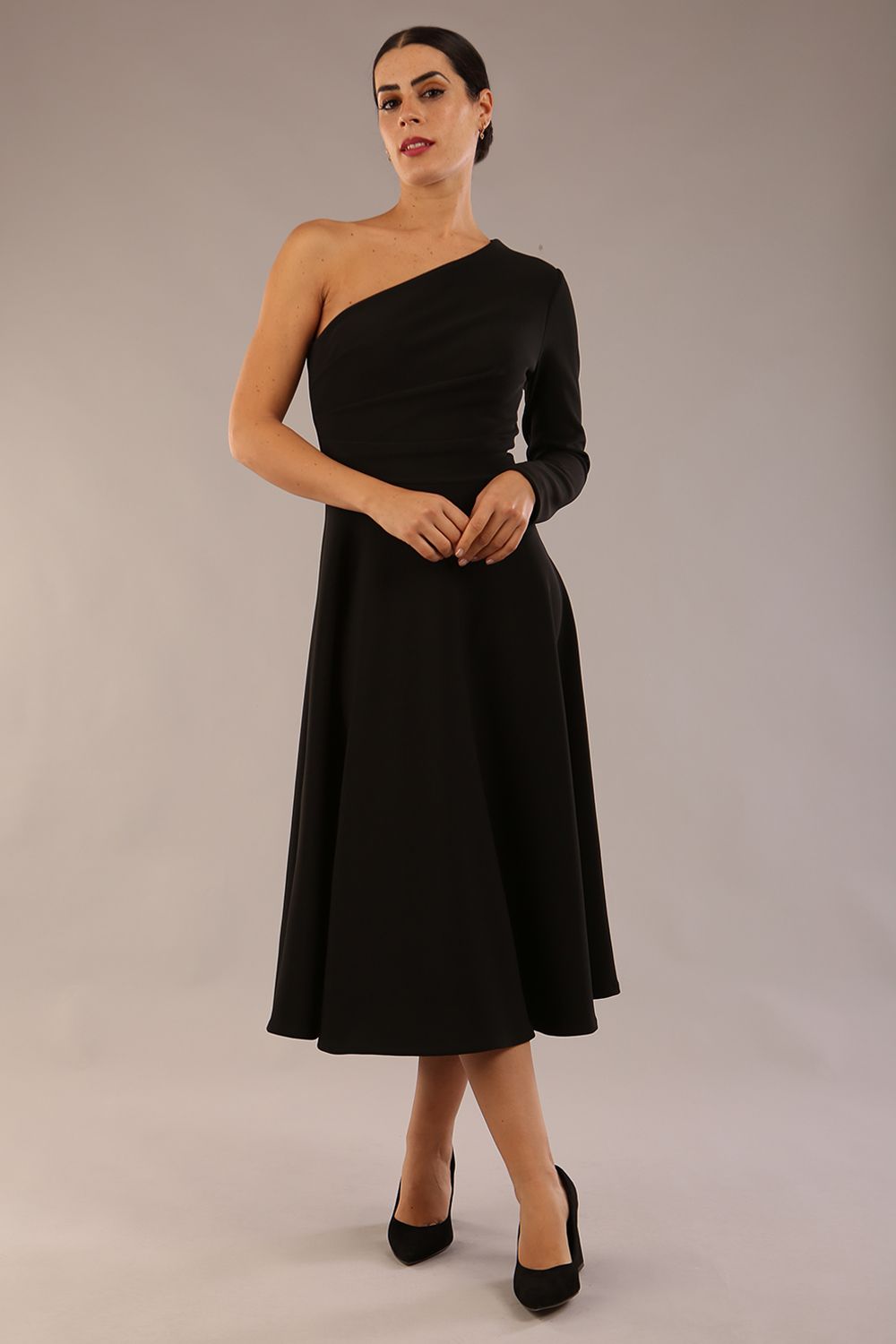 model wearing a diva catwalk Beverley One Shoulder A-line Dress in ribbed super stretch fabric and one long sleeve a-line skirt midi length in black colour front