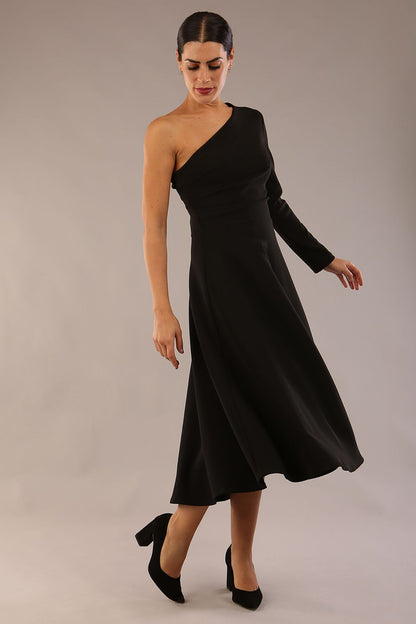 model wearing a diva catwalk Beverley One Shoulder A-line Dress in ribbed super stretch fabric and one long sleeve a-line skirt midi length in black colour front