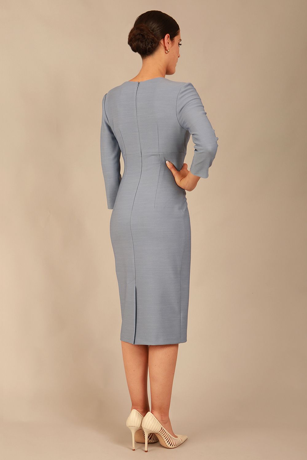 model wearing a diva catwalk pleated shoulder detail of the SEED Addison pencil dress (Steel Blue)