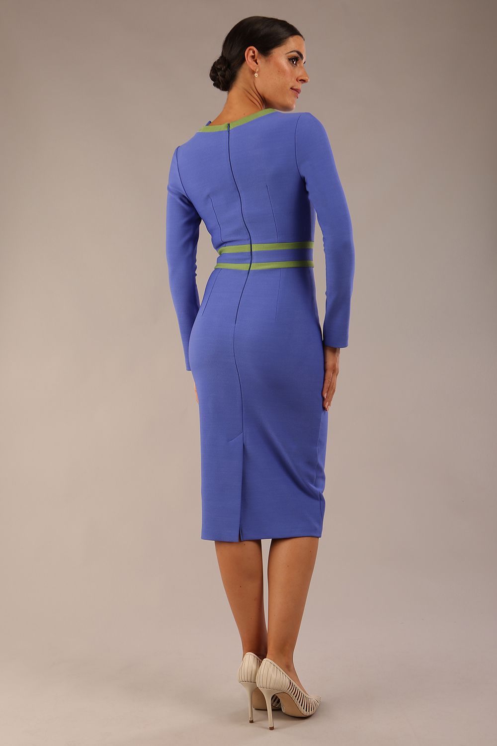 model wearing a diva catwalk SEED Bethany pencil dress in thistle blue with contrasting citrus green trim and bow (Thistle Blue / Citrus Green)