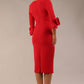Model wearing the diva catwalk SEED Cicely rosette cuff pencil dress highlighting the asymmetric pleated waist and sculpted fit (Salsa Red)