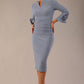 Model wearing the diva catwalk SEED Cicely rosette cuff pencil dress highlighting the asymmetric pleated waist and sculpted fit (Steel Blue)