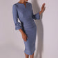Model wearing the diva catwalk SEED Cicely rosette cuff pencil dress highlighting the asymmetric pleated waist and sculpted fit (Steel Blue)