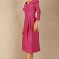 A model wearing a diva catwalk SEED Chrysanta sculptural collar dress in magenta mist 3/4 sleeve A-line dress with a round neckline and concealed zip at the back (Magenta Mist)