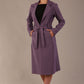 model wearing a diva catwalk Paloma midi coat worn open over a black dress to show its versatility (Dusky Lilac)