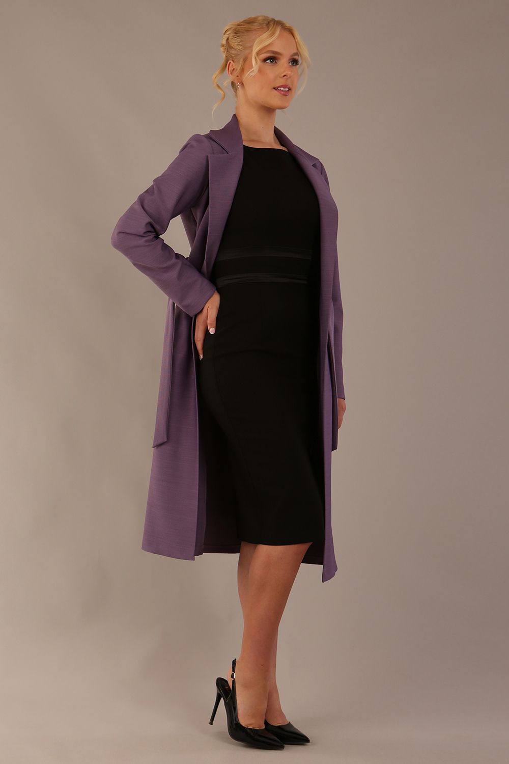 Side view of the Paloma tie-waist coat, highlighting its elegant midi length and fluid drape (Dusky Lilac)