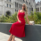 woman wearing a diva catwalk Tamsin Square Neckline Swing Dress sleeveless style with a midaxi  length and side pockets in Scarlet Red colour in Budapest