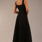 model wearing a diva catwalk Tamsin Square Neckline Swing Dress sleeveless style with a midaxi  length and side pockets in Black colour