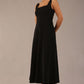 model wearing a diva catwalk Tamsin Square Neckline Swing Dress sleeveless style with a midaxi  length and side pockets in Black colour