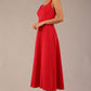 model wearing a diva catwalk Tamsin Square Neckline Swing Dress sleeveless style with a midaxi  length and side pockets in Scarlet Red colour