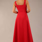 model wearing a diva catwalk Tamsin Square Neckline Swing Dress sleeveless style with a midaxi  length and side pockets in Scarlet Red colour back