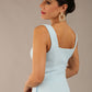 brunette model is wearing a diva catwalk Tamsin Square Neckline Swing Dress sleeveless style with a midaxi  length and side pockets in Sky blue colour back close up