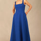 model wearing a diva catwalk Tamsin Square Neckline Swing Dress sleeveless style with a midaxi  length and side pockets in cobalt blue colour