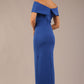 brunette model is wearing a diva catwalk Mariposa Longer Length Dress off the shoulder bardot neckline and midaxi length in cobalt blue colour back image