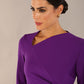 model wearing a diva catwalk Asymetric 3/4 Sleeves Pencil Dress with 3/4 sleeves knee length and asymmetric neckline in passion purple colour front image