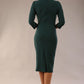 model wearing a diva catwalk Asymetric 3/4 Sleeves Pencil Dress with 3/4 sleeves knee length and asymmetric neckline in forest green colour back image