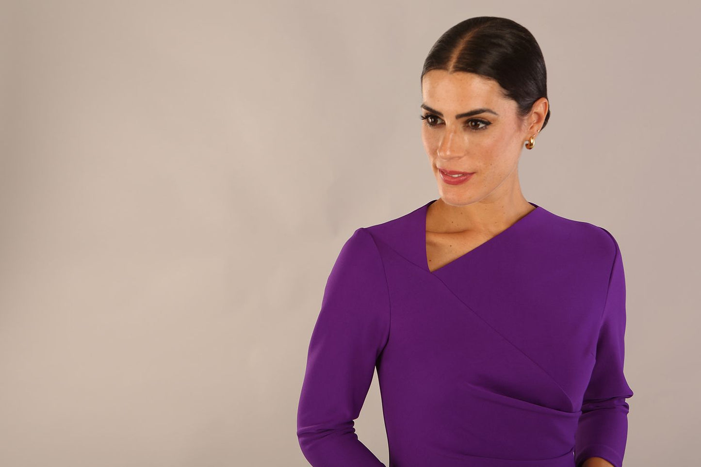 Model wearing diva catwalk Fulham 3/4 Sleeved pencil skirt dress with