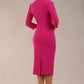 model wearing a diva catwalk Asymetric 3/4 Sleeves Pencil Dress with 3/4 sleeves knee length and asymmetric neckline in magenta haze colour back image