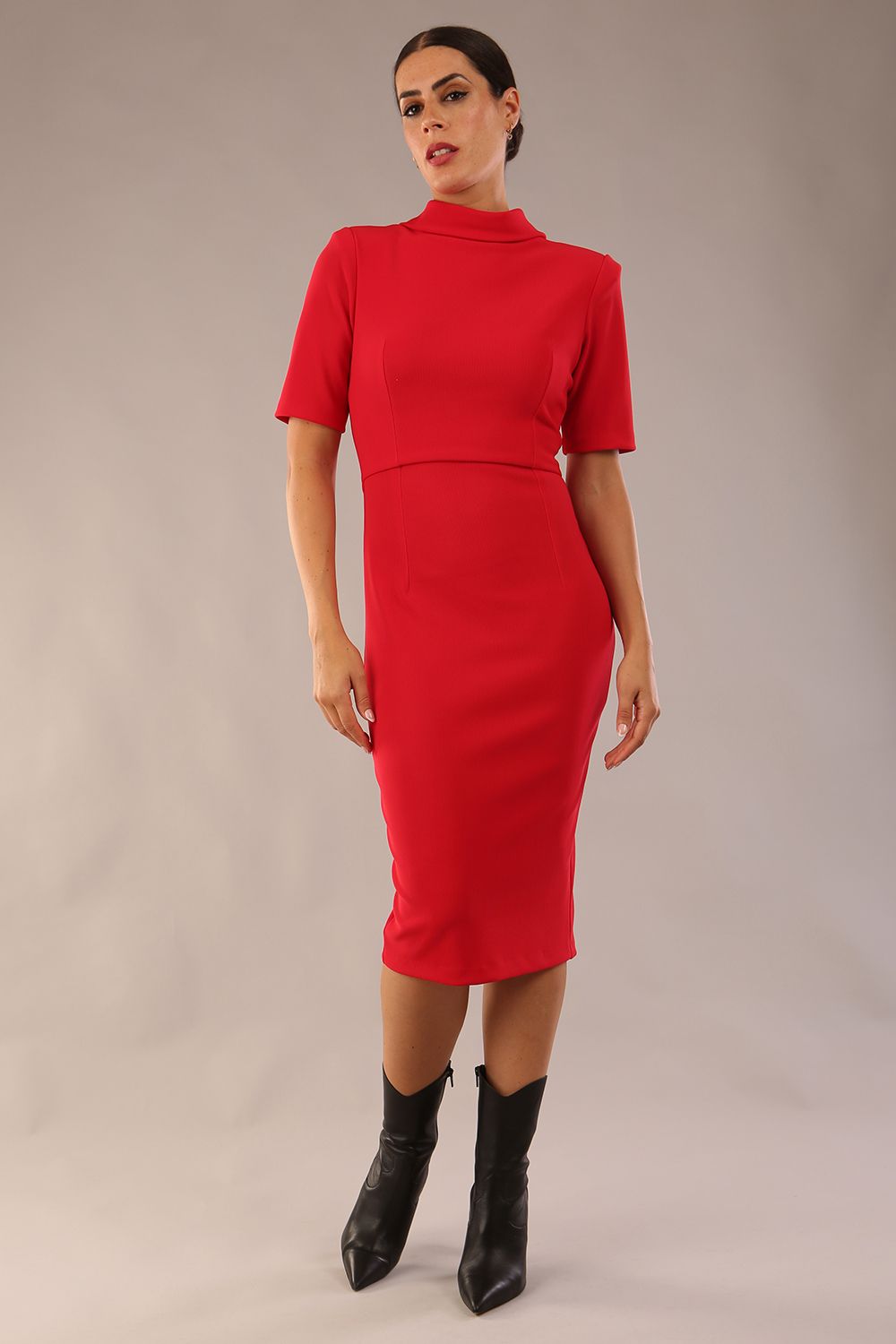 model is wearing a diva catwalk Highmoor Short Sleeved Pencil Dress high neckline and shoulders pad in red colour