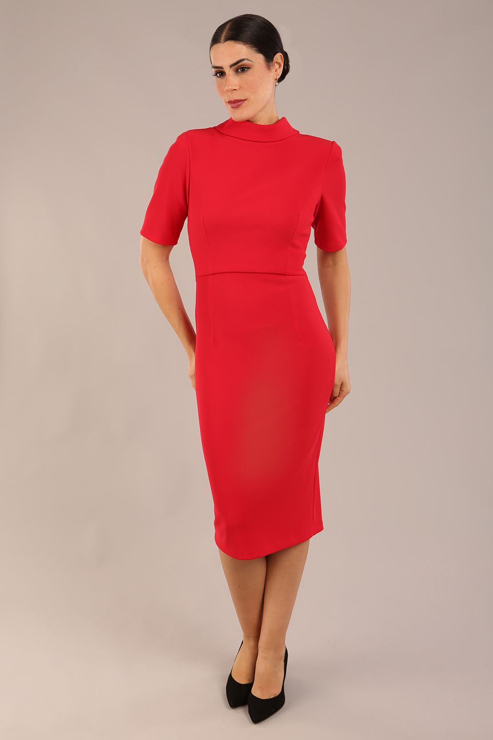 model is wearing a diva catwalk Highmoor Short Sleeved Pencil Dress high neckline and shoulders pad in true red colour