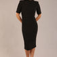 model is wearing a diva catwalk Highmoor Short Sleeved Pencil Dress high neckline and shoulders pads in black colour