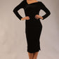 model is wearing a diva catwalk Renoir Long Sleeve Velvet Dress long sleeves midi length with side vent and asymmetric neckline and pleating details in black velvet