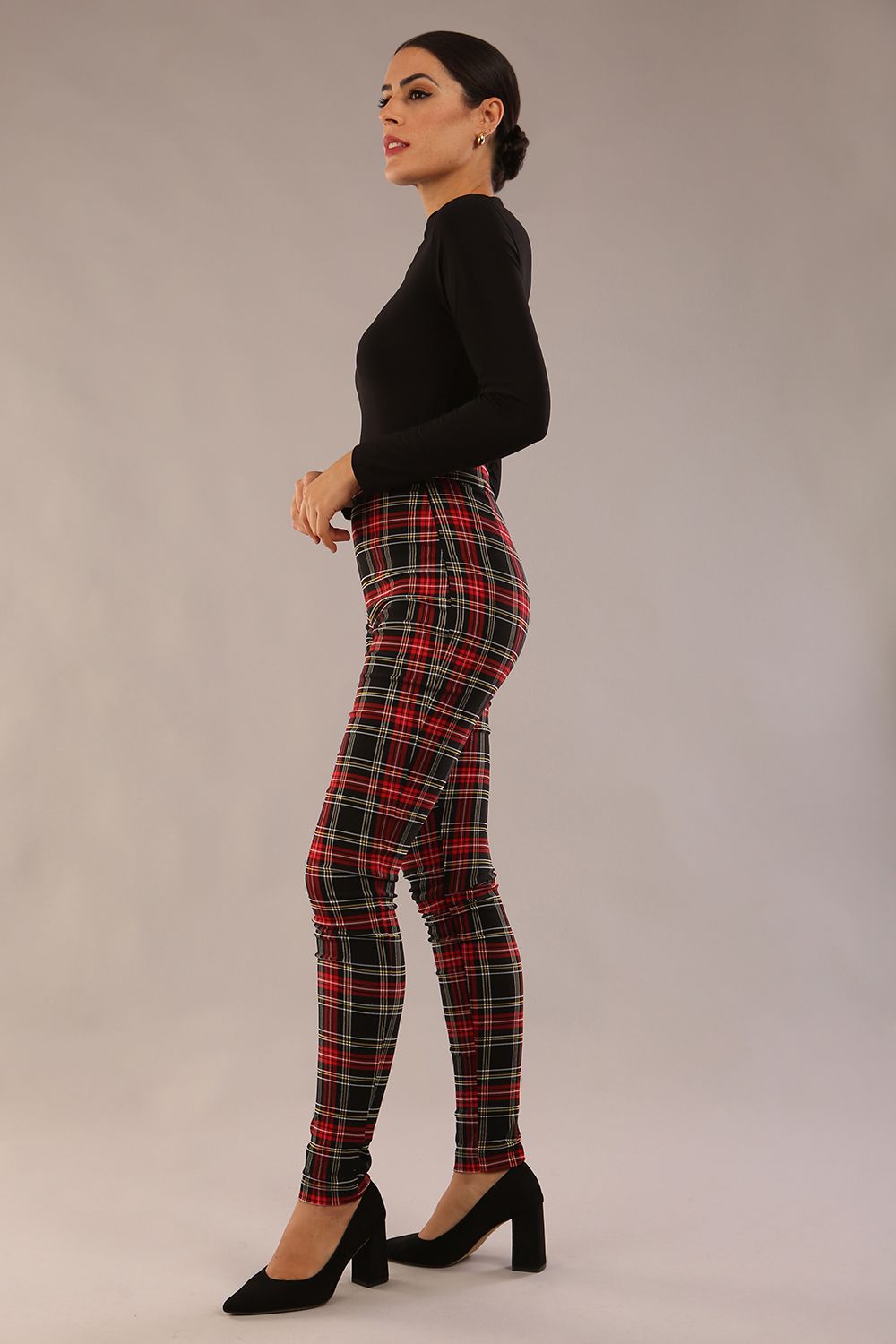 model is wearing a diva catwalk skinny fit Cressida Tartan Stretch Trousers in royal red tartan colour 