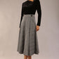 model is wearing a diva catwalk Velana Soft-Touch Check Midi Skirt wrap a-line design in misty grey check